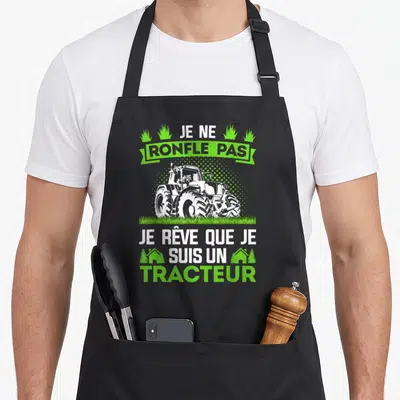 Tablier de cuisine noir avec illustration de tracteur et texte Je ne ronfle pas je rêve que je suis un tracteur