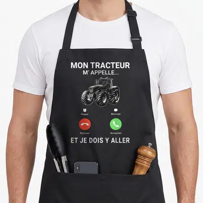 Tablier de cuisine noir avec illustration d'un tracteur et interface d'appel téléphonique blanche rouge et verte imprimée au centre.