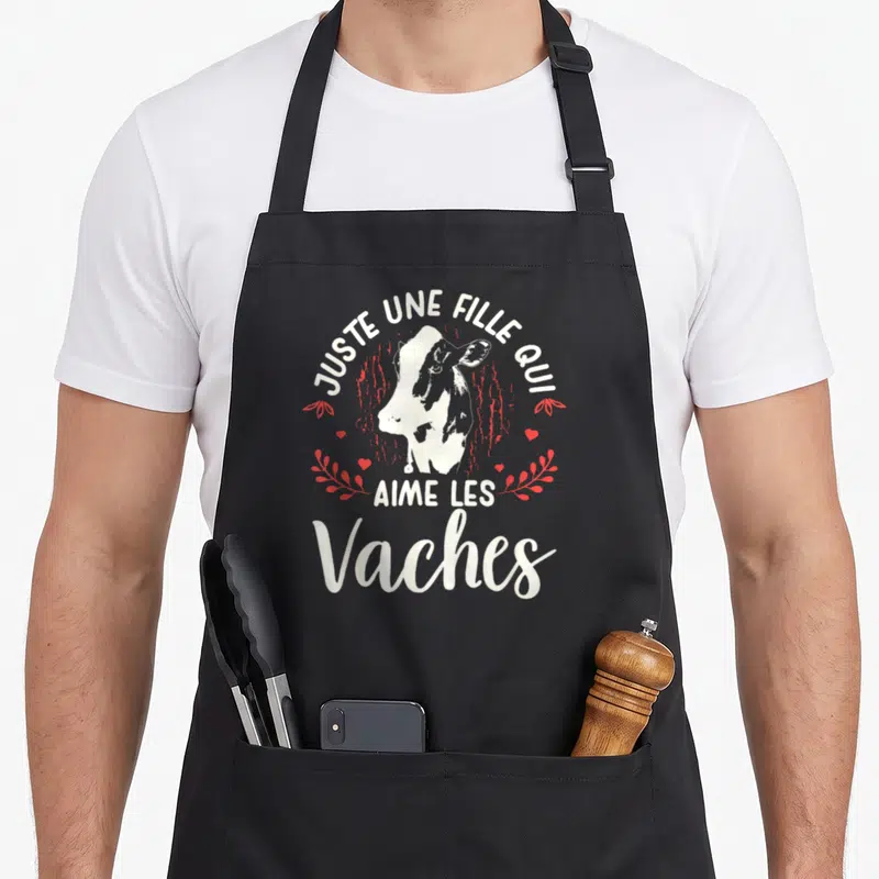 Tablier de cuisine noir avec illustration de profil de vache blanche et texte blanc Juste une fille qui aime les vaches.