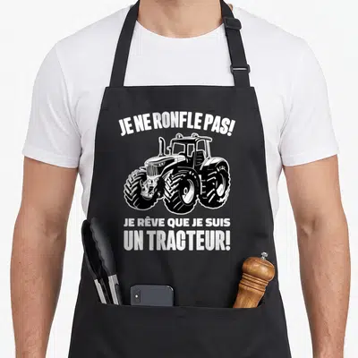 Tablier de cuisine noir avec illustration de tracteur et texte blanc Je ne ronfle pas je rêve que je suis un tracteur