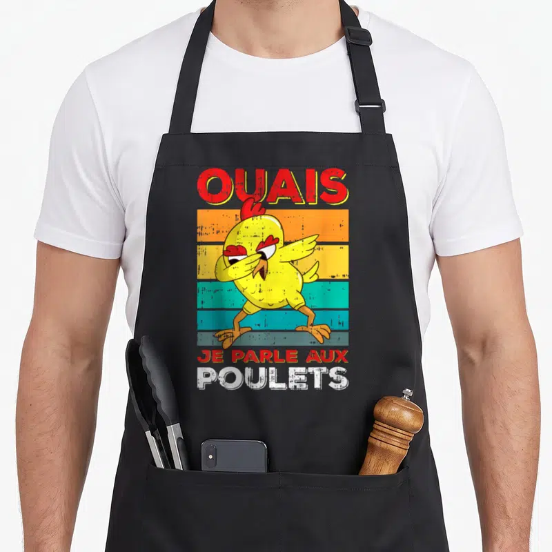 Tablier de cuisine noir avec un poulet jaune en train de faire le dab et le texte Ouais Je Parle Aux Poulets imprimé en lettres colorées.
