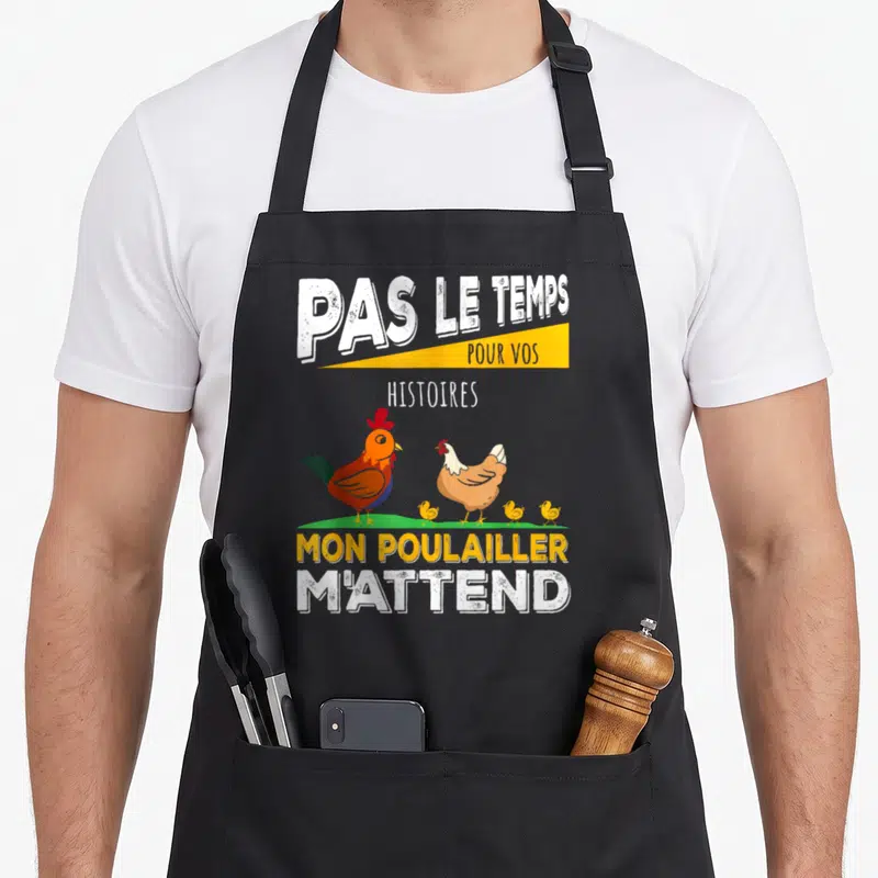 Tablier de cuisine noir avec inscription Pas le temps pour vos histoires mon poulailler m'attend et illustration de poules colorées.