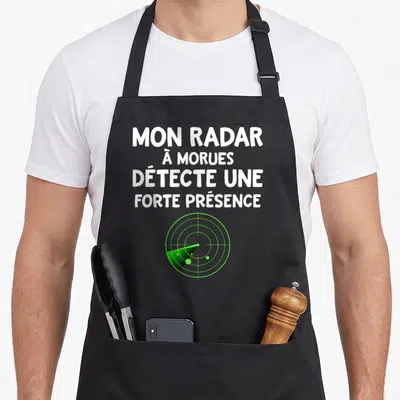 Tablier de cuisine noir avec inscription blanche et graphique radar vert détectant des morues