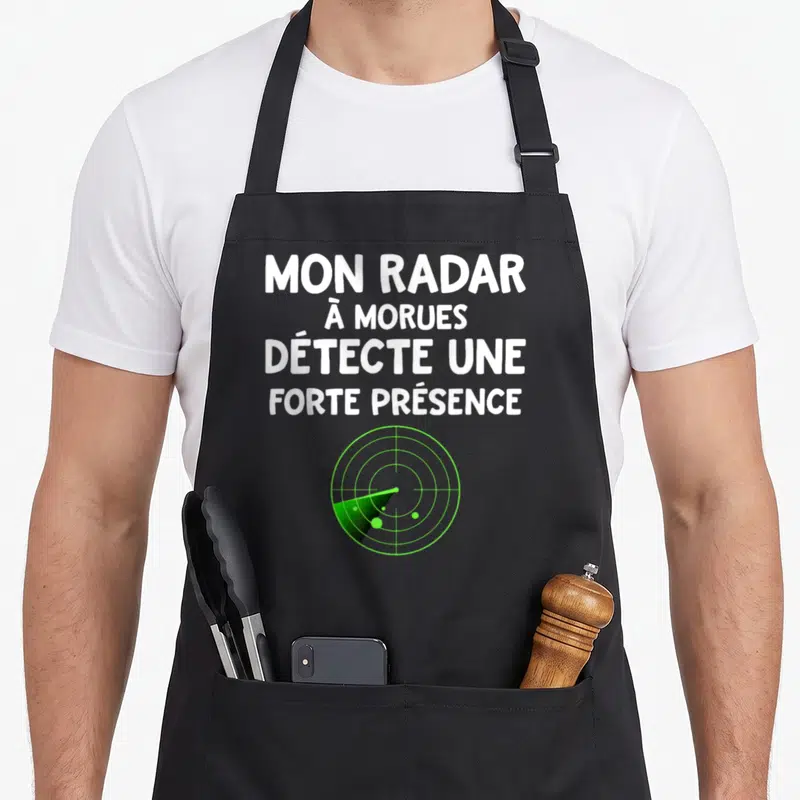 Tablier de cuisine noir avec inscription blanche et graphique radar vert détectant des morues