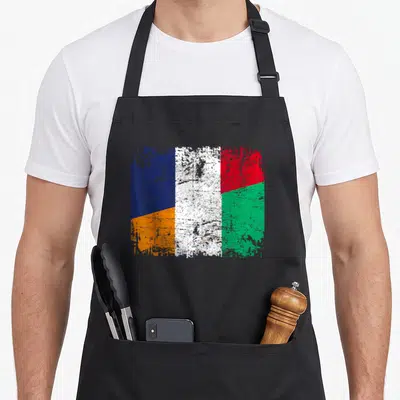 Tablier de cuisine noir avec le motif du Drapeau de l'Amitié entre la Cote d'Ivoire et la France en style délavé.