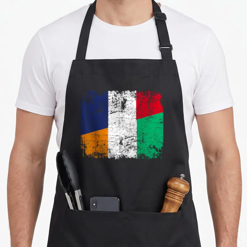 Tablier de cuisine noir avec le motif du Drapeau de l'Amitié entre la Cote d'Ivoire et la France en style délavé.
