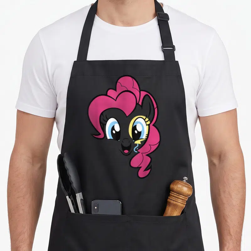 Tablier de cuisine noir avec l illustration du visage souriant de Pinkie Pie aux cheveux roses et yeux bleus.
