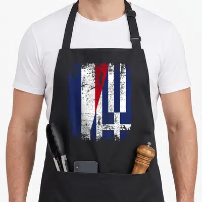 Tablier de cuisine noir avec un drapeau de l'amitié Grèce France stylisé vintage.
