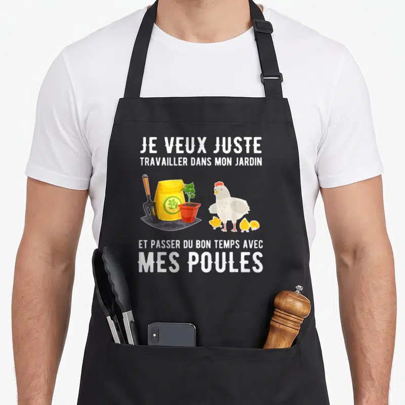 Tablier de cuisine noir avec illustration de poule, poussins, pot de fleur et bêche sous le texte Je veux juste travailler dans mon jardin.
