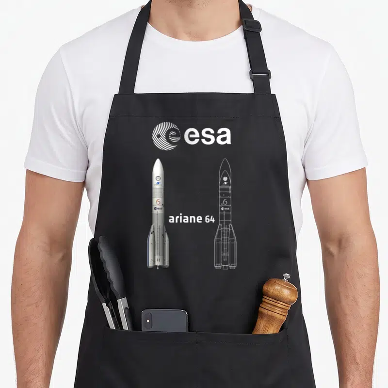 Tablier de cuisine noir avec illustration technique d'une fusée Ariane 64 et le logoESA en blanc.