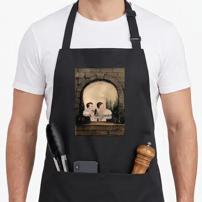 Tablier de cuisine noir avec illustration vintage de deux enfants formant un crâne par illusion d'optique dans une fenêtre en pierre.