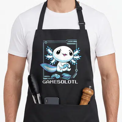 Tablier de cuisine noir avec un axolotl blanc tenant une manette bleue et le texte Gamesolotl en bas.