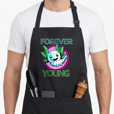 Tablier de cuisine noir avec illustration colorée d'un axolotl souriant et des mots Forever Young en typographie rétro.