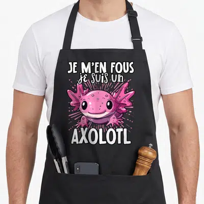 Tablier de cuisine noir avec un axolotl rose souriant et le texte Je m'en fous je suis un axolotl en blanc.