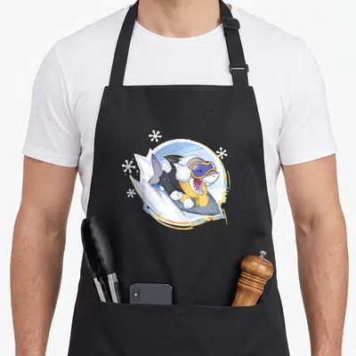 Tablier de cuisine noir avec Jeff le Requin Terrestre Cuddly Fuzzlefin surfant dans un cercle décoratif bleu et blanc.