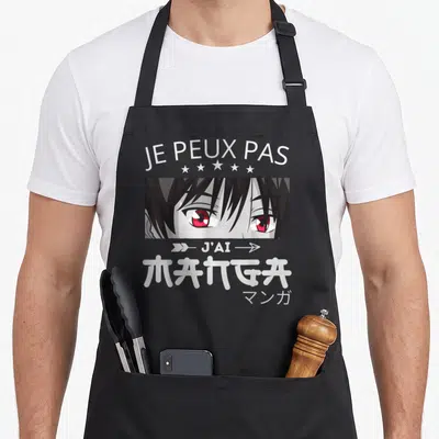 Tablier de cuisine noir avec visage manga aux yeux rouges et texte blanc Je peux pas j'ai manga