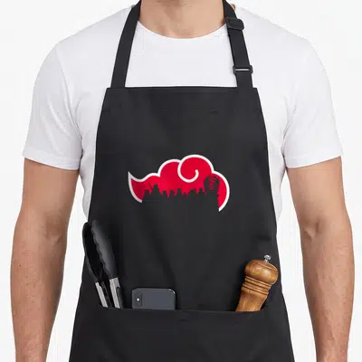Tablier de cuisine noir avec le logo nuage rouge et silhouettes d'Akatsuki imprimés au centre.