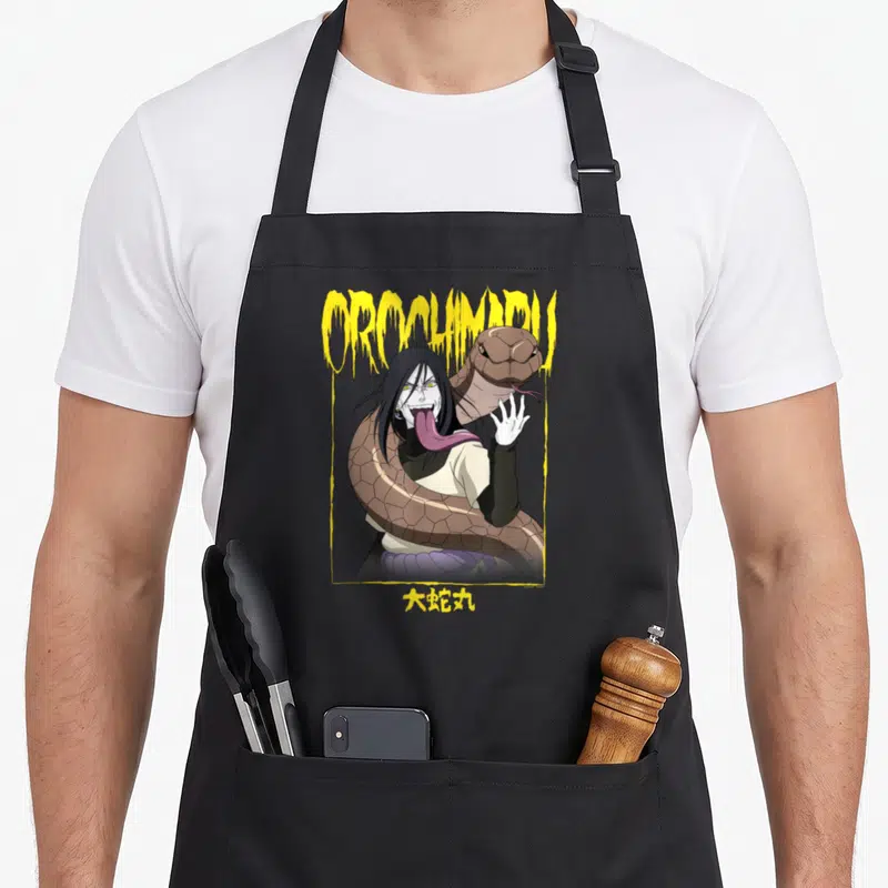 Tablier de cuisine noir avec une illustration d'Orochimaru entouré d'un serpent et encadré par un logo jaune.