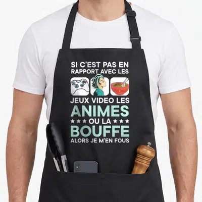 Tablier de cuisine noir avec inscription blanche et mint sur les passions des gamers et amateurs d'anime.
