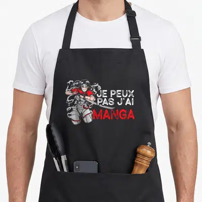 Tablier de cuisine noir avec illustration samouraï et texte Je peux pas j'ai manga en blanc et rouge.