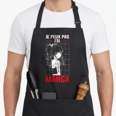 Tablier de cuisine noir avec illustration d'une fille aux tatouages et texte Je peux pas j'ai manga en blanc et rouge.