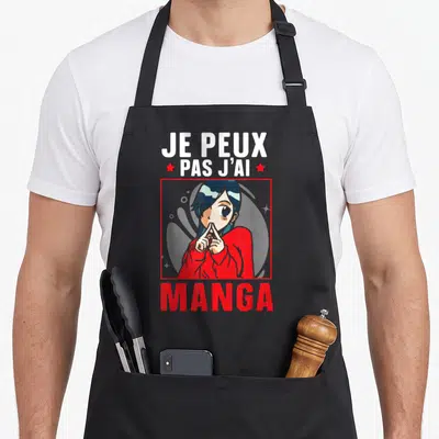 Tablier de cuisine noir avec une illustration de fille au style manga et le texte Je peux pas j'ai manga.