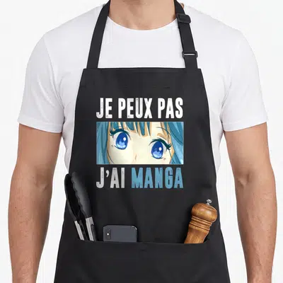 Tablier de cuisine noir avec visage d'animé aux grands yeux bleus et texte blanc Je peux pas j'ai manga.