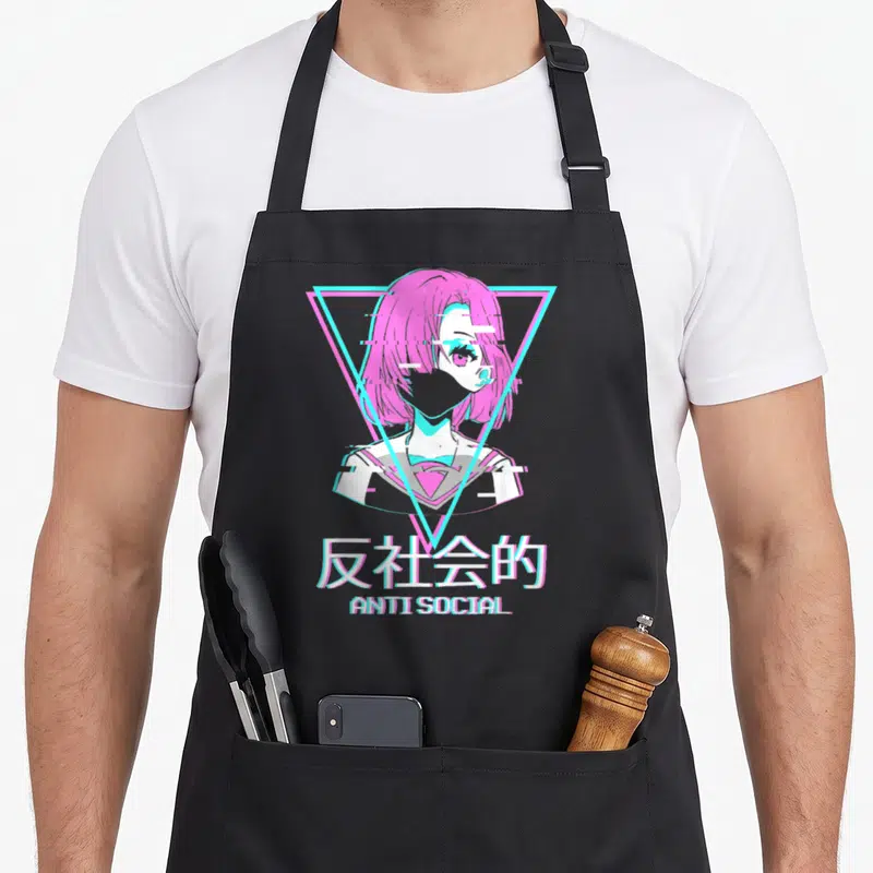 Tablier de cuisine noir avec illustration d'une fille aux cheveux roses, cadre géométrique cyan et texte ANTI SOCIAL sous des idéogrammes japonais.