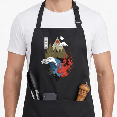 Tablier de cuisine noir avec illustration losange représentant montagne, vague, feu et nuages en style japonais traditionnel.