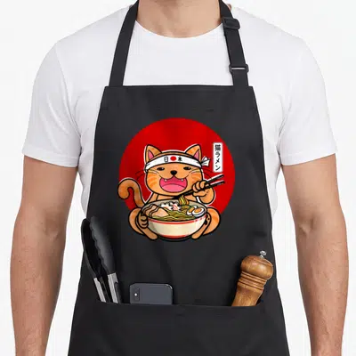 Tablier de cuisine noir avec illustration d'un chat mangeant du ramen et portant un bandeau Japan