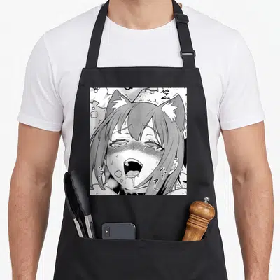 Tablier de cuisine noir avec illustration d'une fille aux oreilles de chat au visage expressif en noir et blanc.