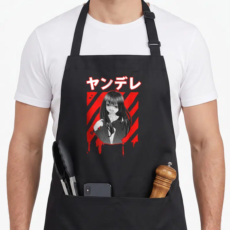 Tablier de cuisine noir avec illustration yandere et texte japonais redoutable