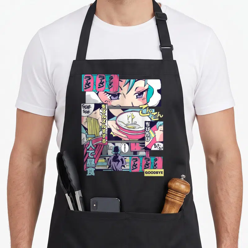 Tablier de cuisine noir avec illustration manga colorée d'une fille mangeant du ramen dans un style vaporwave 90's.
