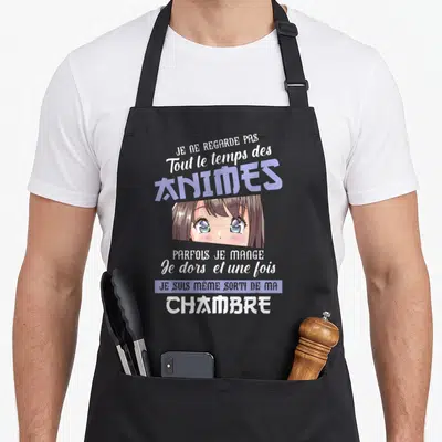 Tablier de cuisine noir avec une illustration de fille anime et le texte Je ne regarde pas tout le temps des animés chambre