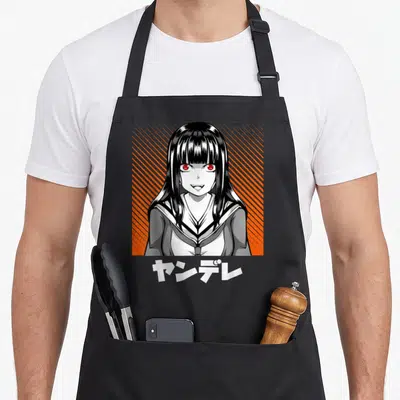 Tablier de cuisine noir avec illustration d'une fille Yandere aux yeux rouges et texte Kanji blanc.