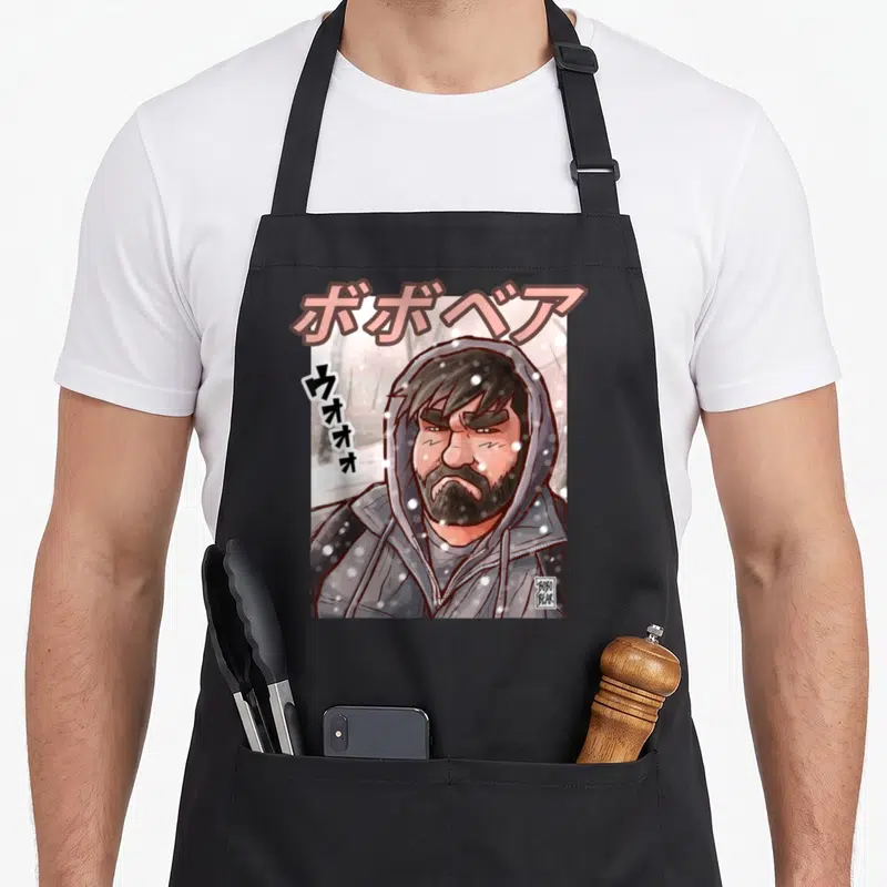 Tablier de cuisine noir avec illustration Bobo Bear en « hoodie » sous la neige et texte japonais rose