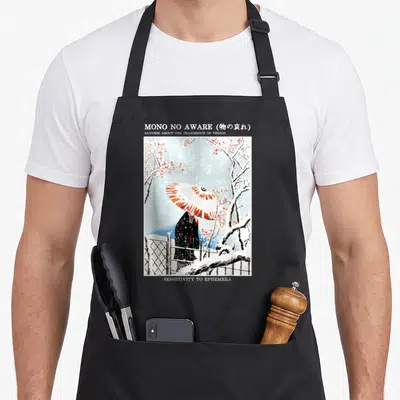 Tablier de cuisine noir avec illustration Ukiyo-e d'un personnage au parapluie sous des branches de prunier enneigées.