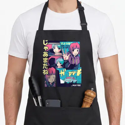 Tablier de cuisine noir avec illustration manga couleur personnages et texte See You Later Maybe