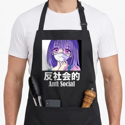 Tablier de cuisine noir avec une illustration anime de fille au masque et texte Anti Social en blanc.