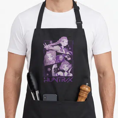 Tablier de cuisine noir avec illustration violette des personnages Rumi, Mithra et Zoey du groupe Huntrix en style manga.