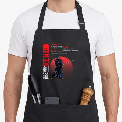 Tablier de cuisine noir avec illustration d'un samouraï Kendo, texte Kendo et cercle rouge haltoné.