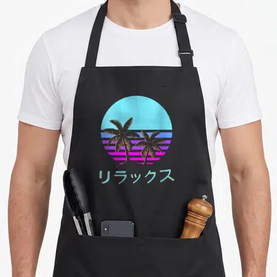 Tablier de cuisine noir avec un soleil cyan, des palmiers dorés et des caracteres japonais sur fond de bandes roses et bleues.