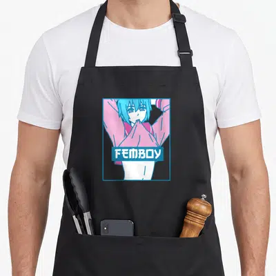 Tablier de cuisine noir avec illustration d'un personnage aux cheveux bleus et le mot FEMBOY en lettres blanches sur fond bleu.
