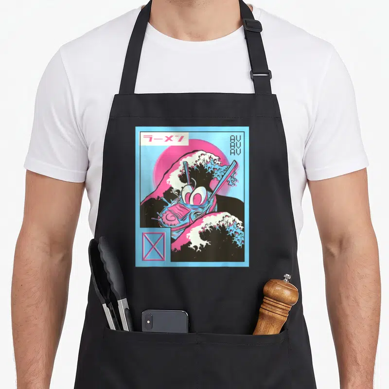 Tablier de cuisine noir avec illustration Vaporwave d'un bol de Ramen aux couleurs pastel et motifs de vagues japonaises.
