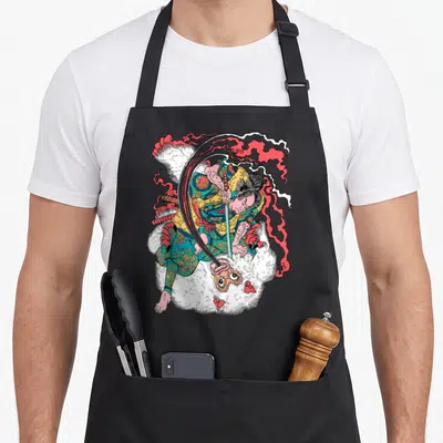 Tablier de cuisine noir avec illustration d'un samouraï attaquant un onie blanc en style ukiyo-e.
