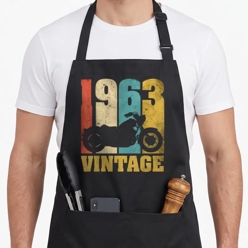 Tablier de cuisine noir avec illustration vintage 1963 et silhouette de moto multicolore