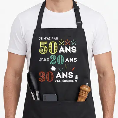 Tablier de cuisine noir avec texte Je n'ai pas 50 ans j'ai 20 ans plus 30 ans d'expérience en couleurs vives.