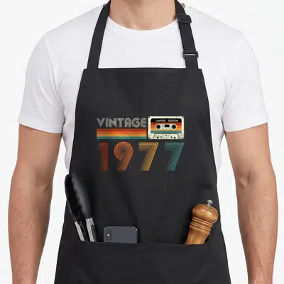 Tablier de cuisine noir avec illustration de cassette vintage couleur 1977 Limited Edition