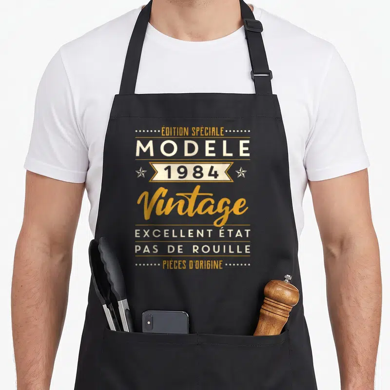 Tablier de cuisine noir avec inscription édition spéciale modèle 1984 vintage excellent état pièces d'origine
