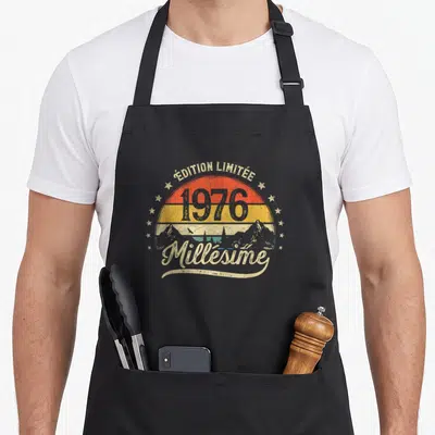 Tablier de cuisine noir avec motif vintage 1976 millésime soleil et montagnes